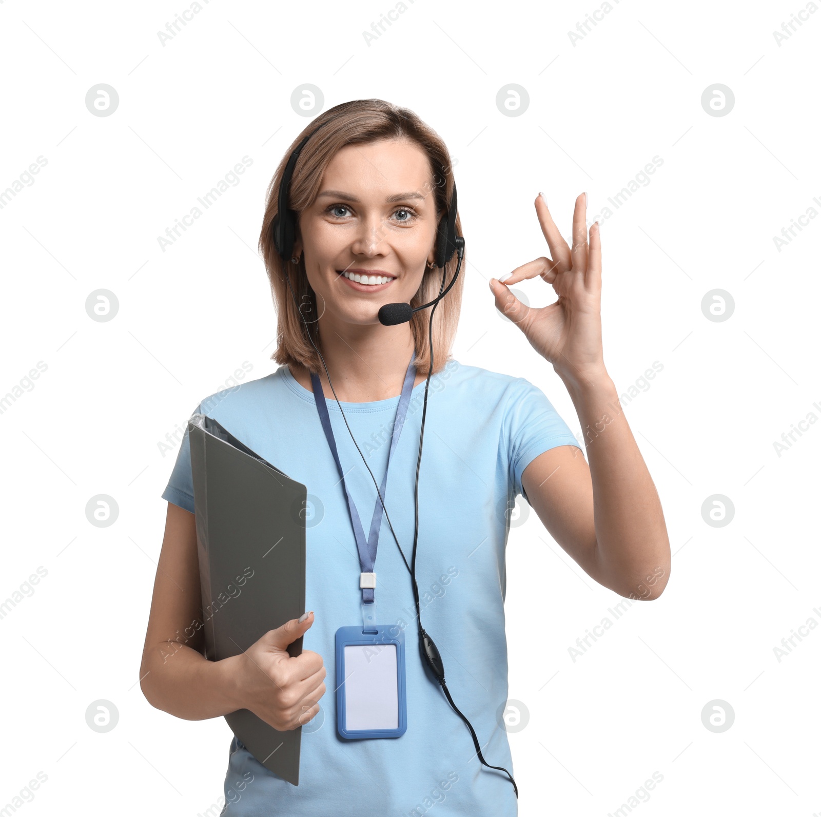 Photo of Technical support call center. Smiling operator with folder showing ok gesture on white background