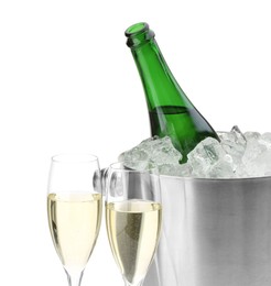 Photo of Champagne in glasses and ice bucket with open bottle isolated on white