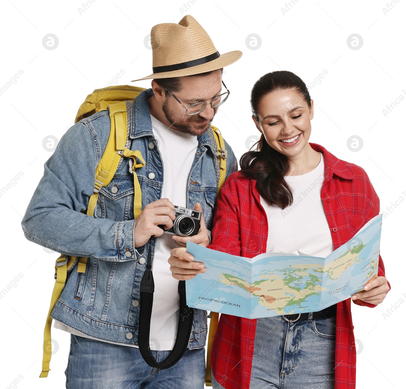 Photo of Tourism. Happy couple with map and camera on white background