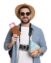 Happy tourist in hat with camera, passport and ticket on white background