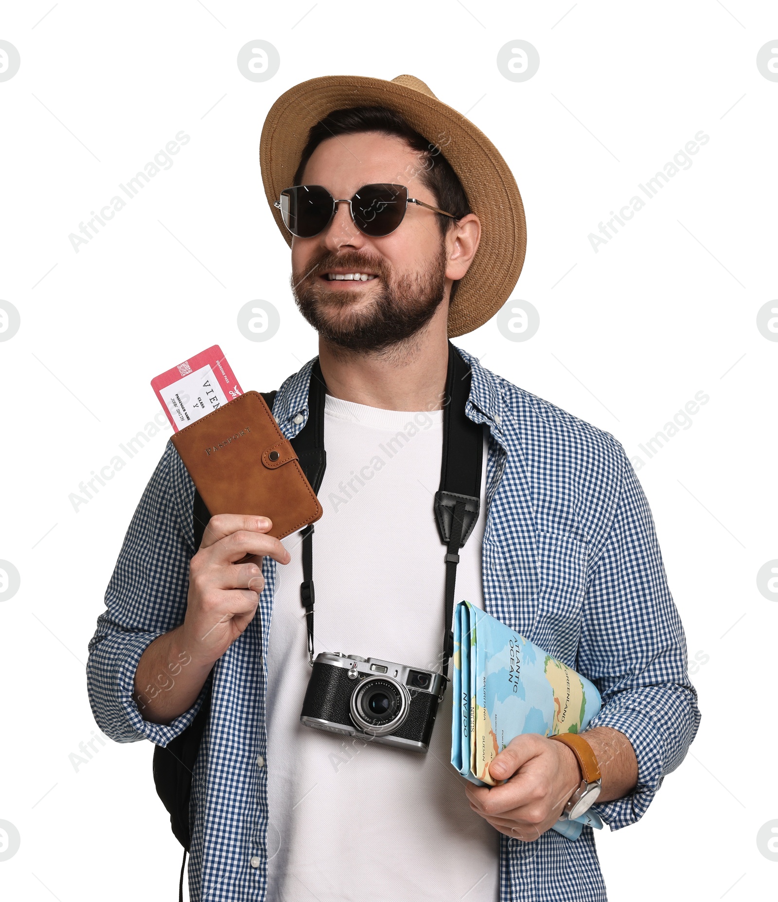 Photo of Happy tourist in hat with camera, passport and ticket on white background