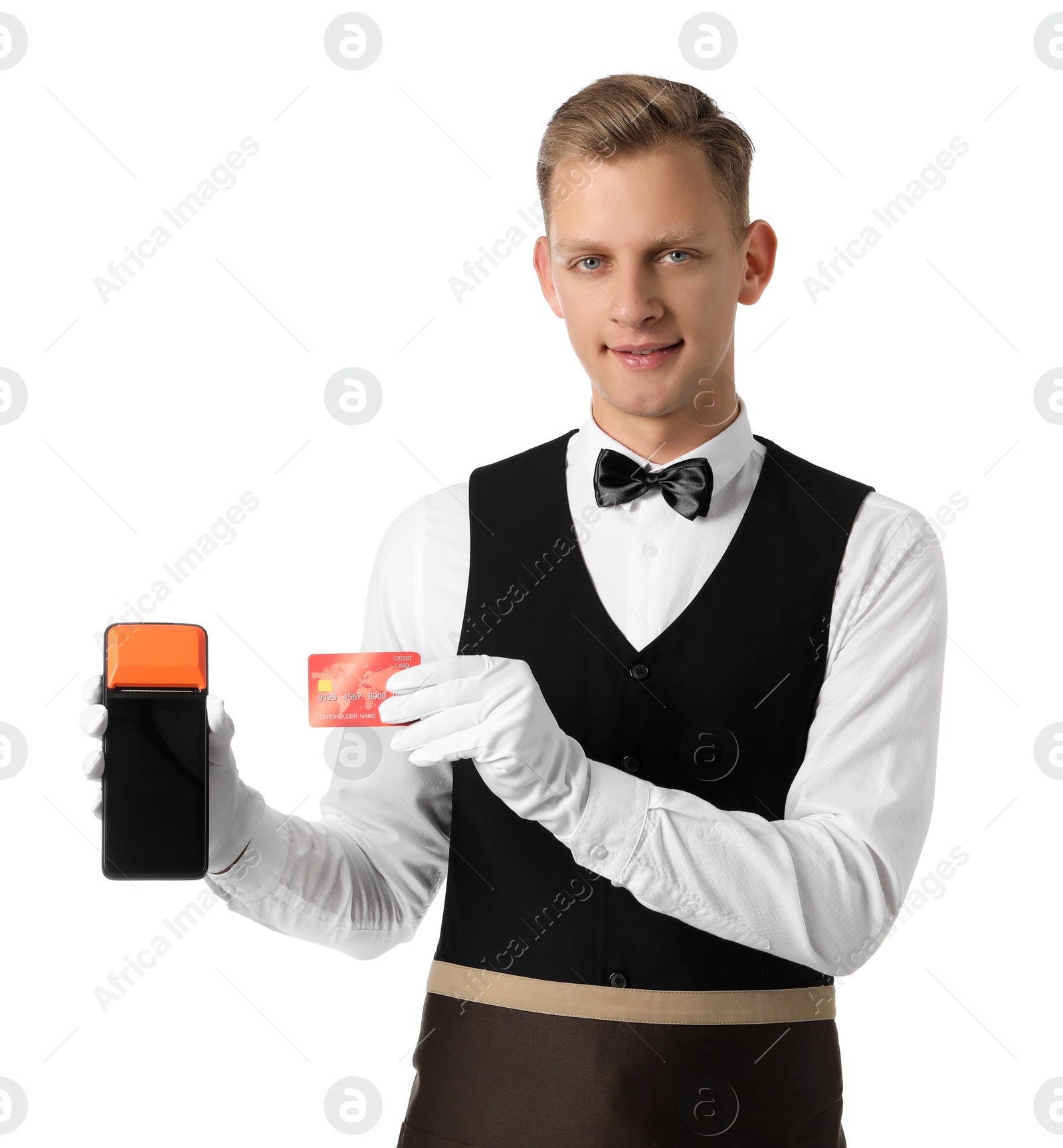 Photo of Happy waiter with payment terminal and debit card on white background