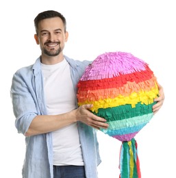 Photo of Happy man with colorful pinata on white background