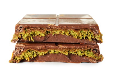 Photo of Pieces of Dubai chocolate bar with pistachio and knafeh isolated on white