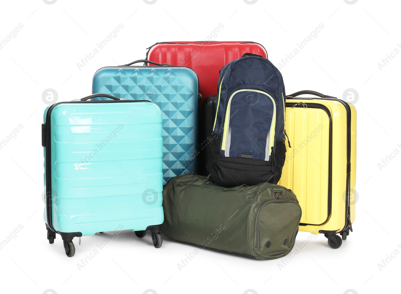 Photo of Colorful suitcases, bag and backpack isolated on white