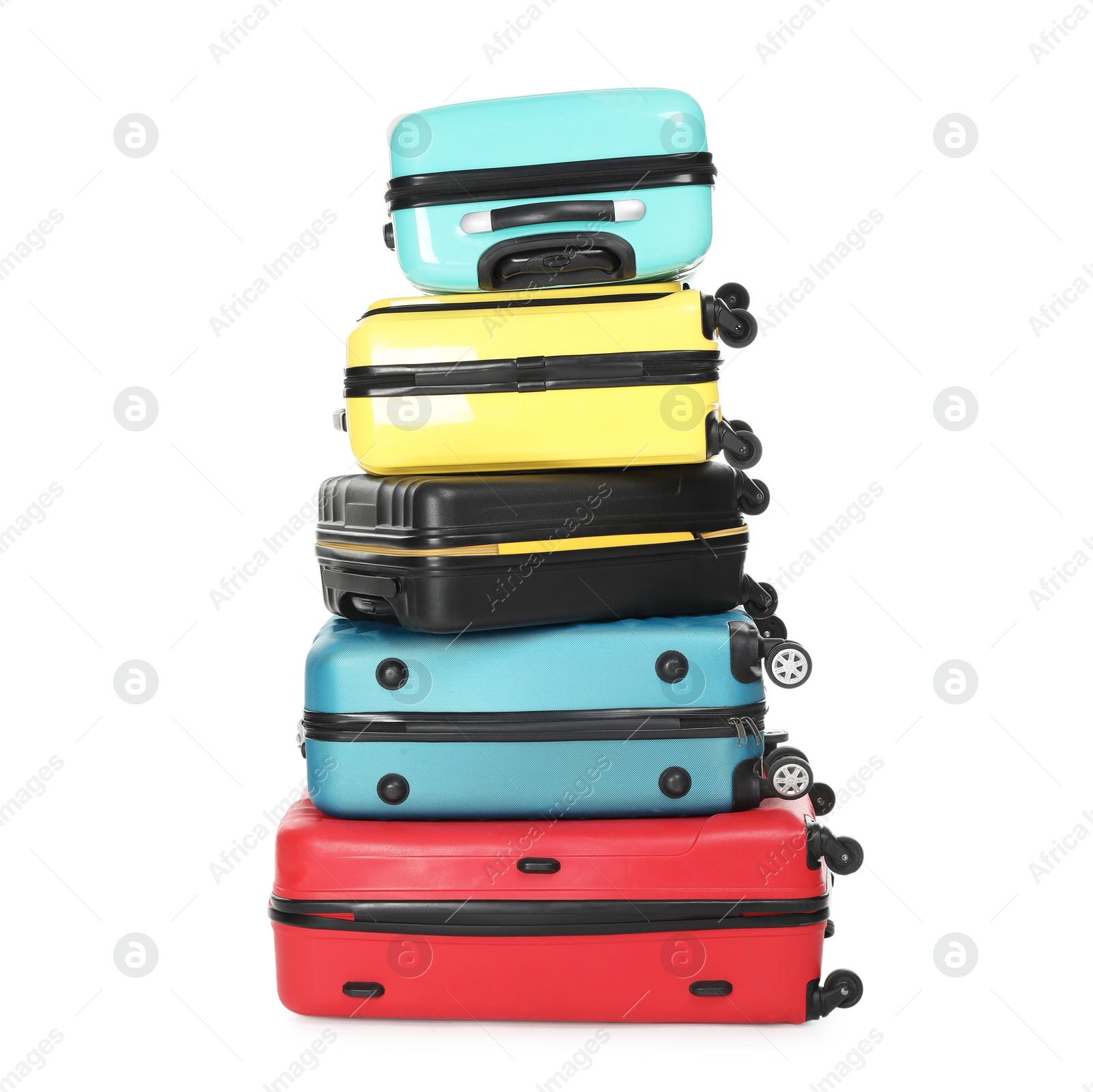 Photo of Stack of colorful suitcases isolated on white