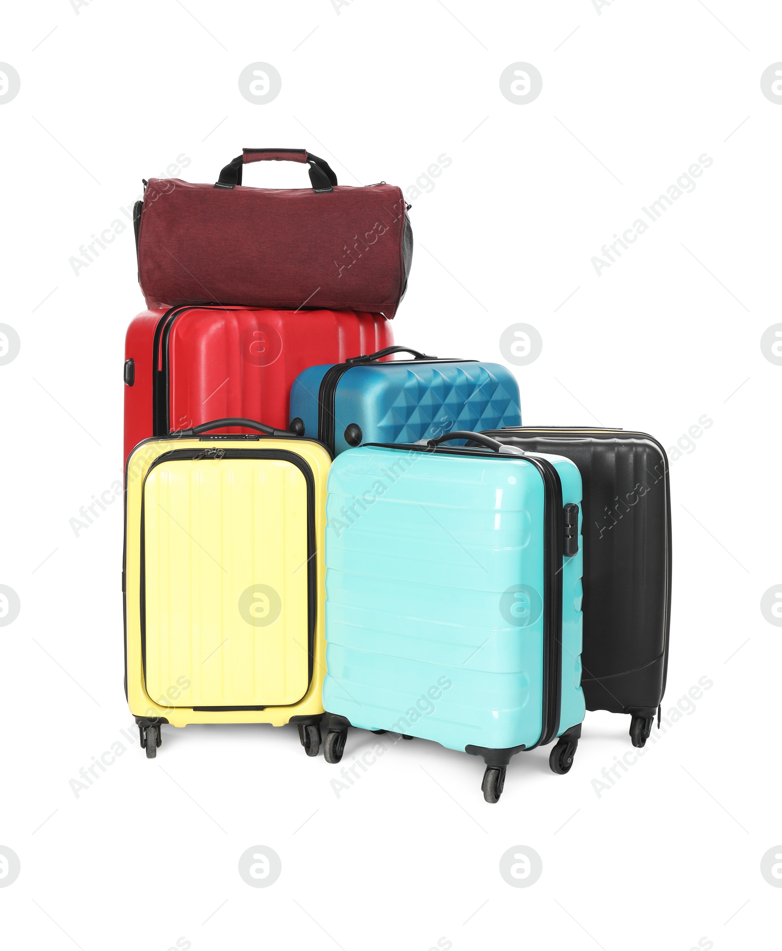 Photo of Many colorful suitcases and bag isolated on white