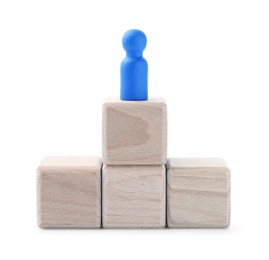 Photo of Blue human figure on wooden blocks against white background. Competition concept