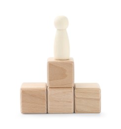 Photo of Human figure on wooden blocks against white background. Competition concept