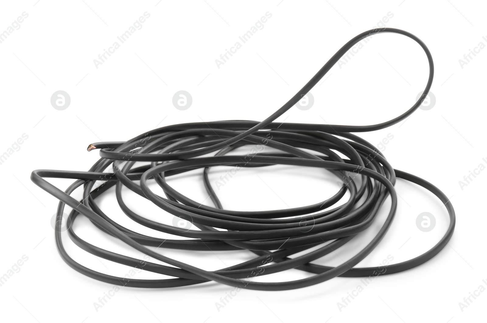 Photo of Tangled insulated electrical wire on white background