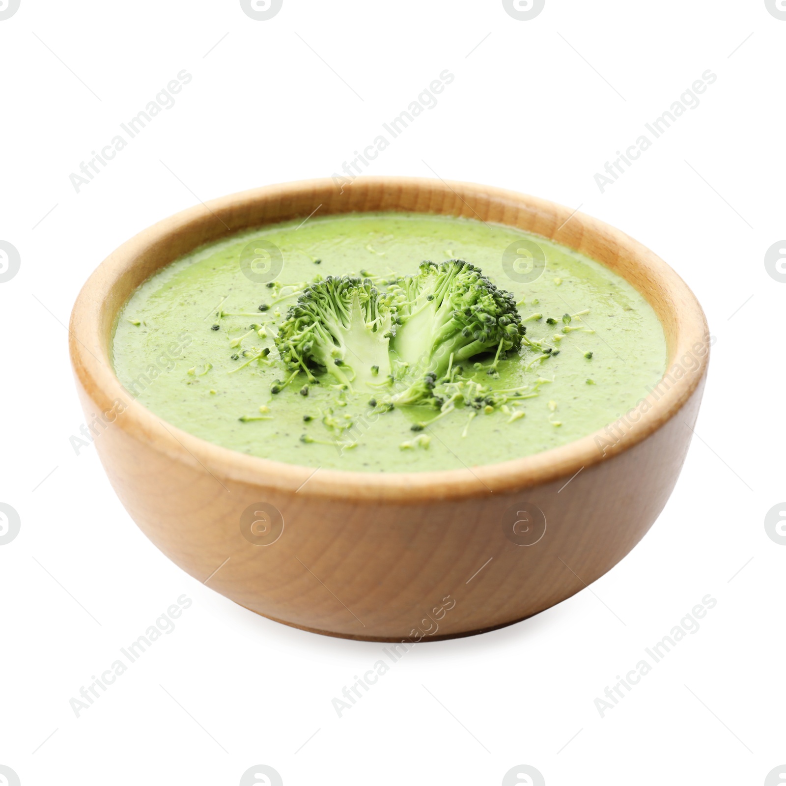 Photo of Delicious broccoli cream soup in bowl isolated on white