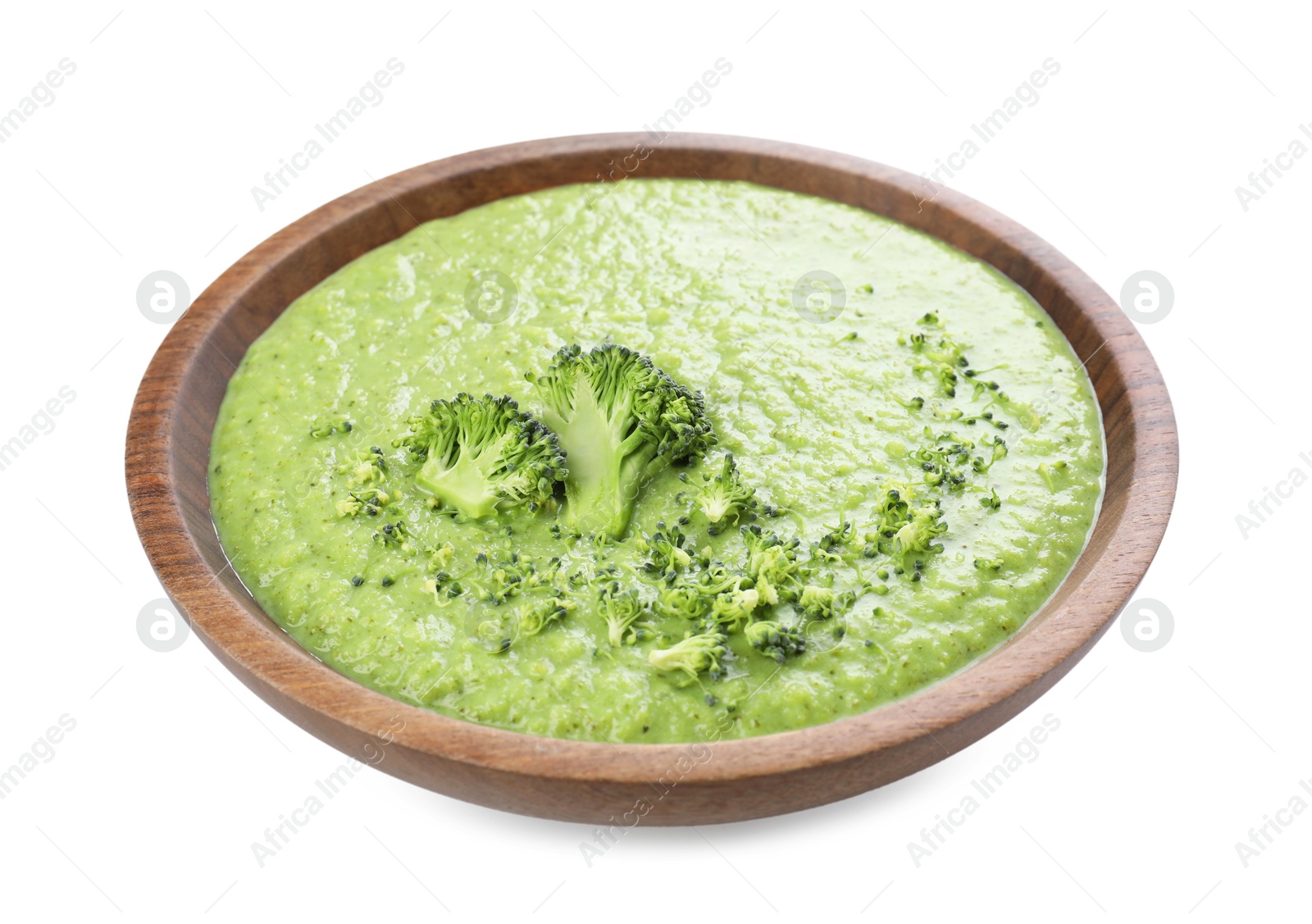 Photo of Delicious broccoli cream soup in bowl isolated on white