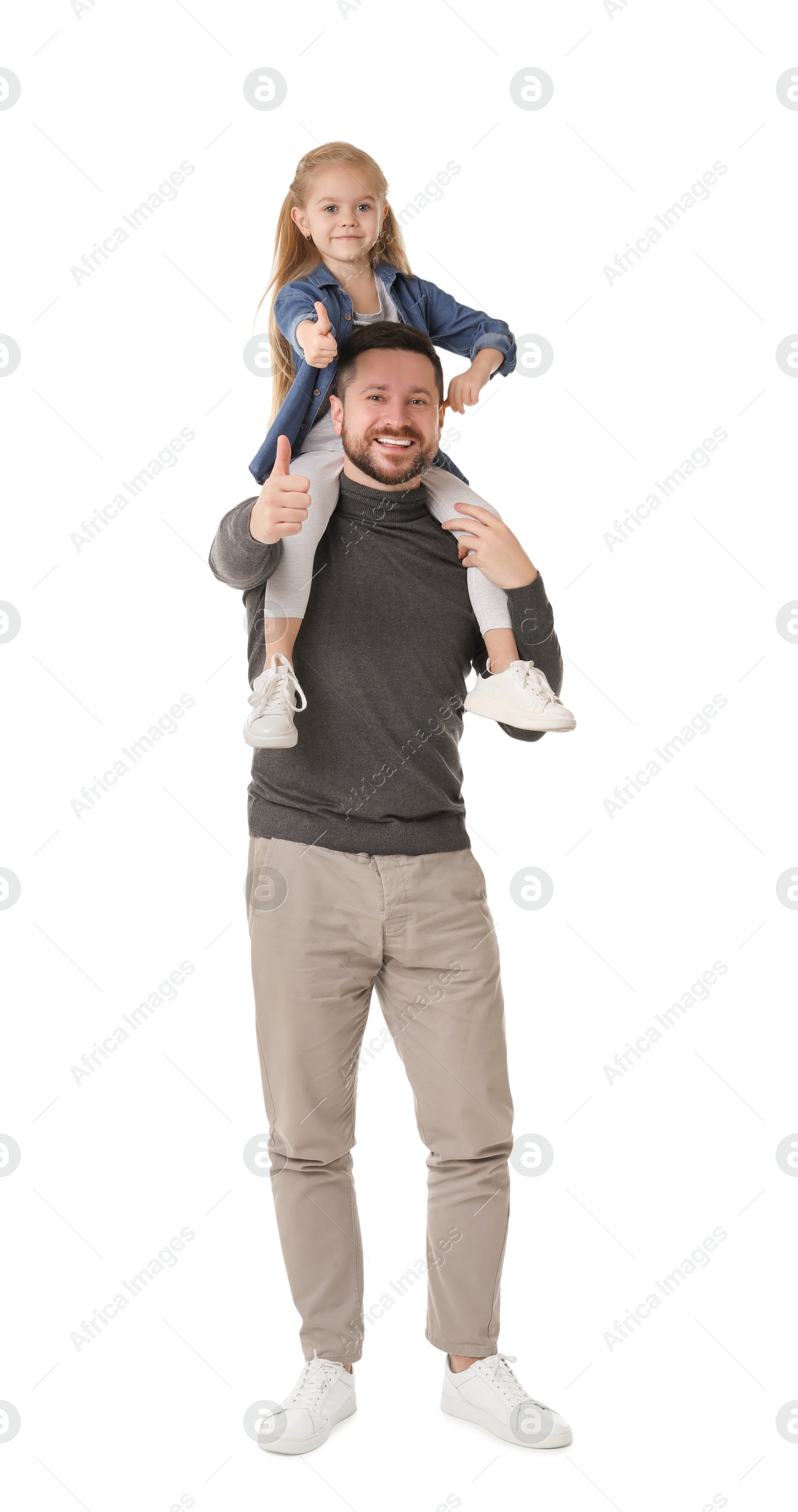 Photo of Happy father with his cute little daughter showing thumbs up on white background