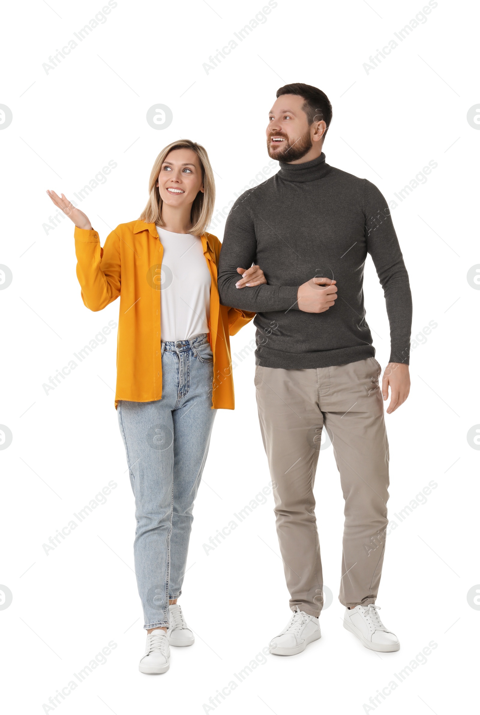 Photo of Man and woman walking on white background