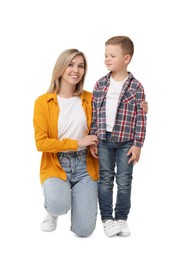 Happy mother with her cute little son on white background