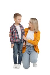 Happy mother with her cute little son on white background