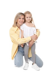 Happy mother and her cute little daughter on white background