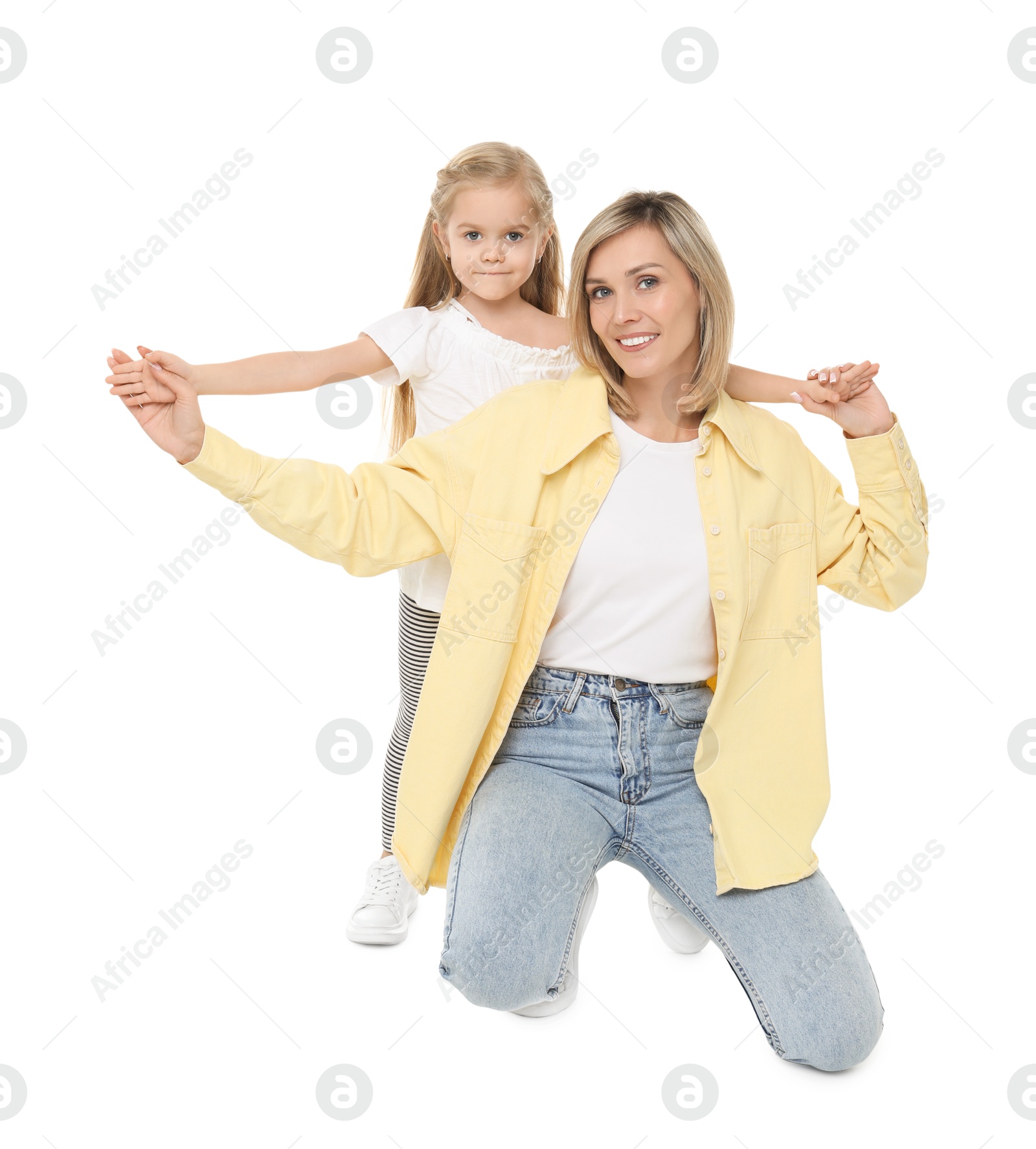 Photo of Happy mother and her cute little daughter on white background