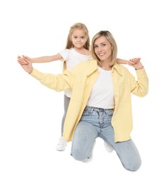 Photo of Happy mother and her cute little daughter on white background