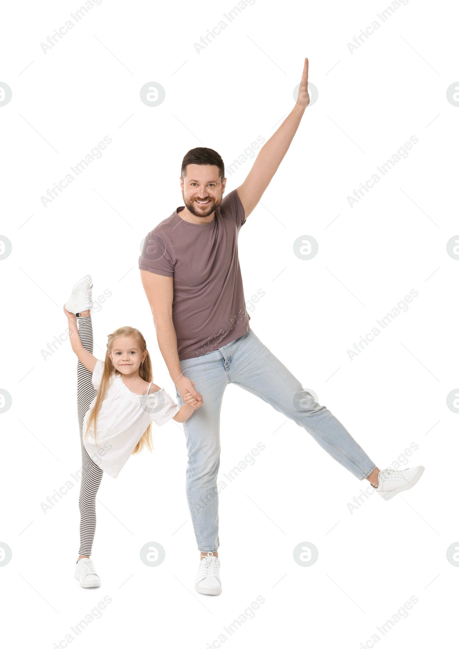 Photo of Happy father and his cute little daughter having fun on white background