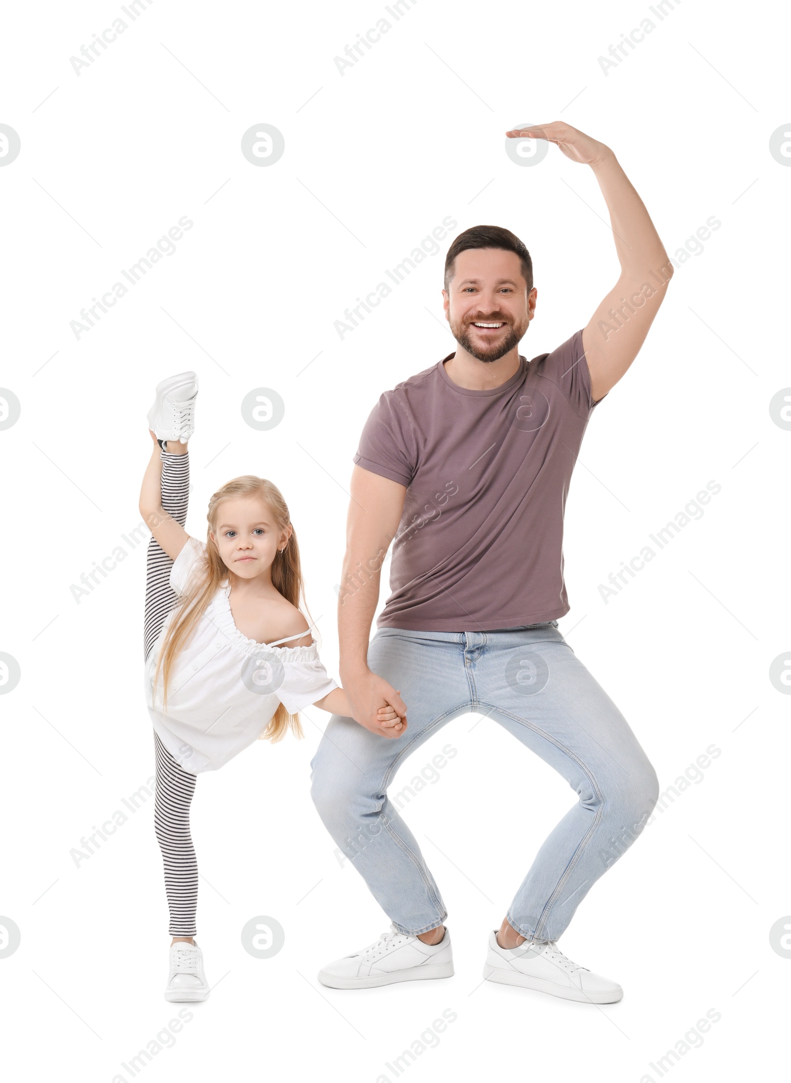 Photo of Happy father and his cute little daughter having fun on white background