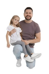 Happy father and his cute little daughter on white background