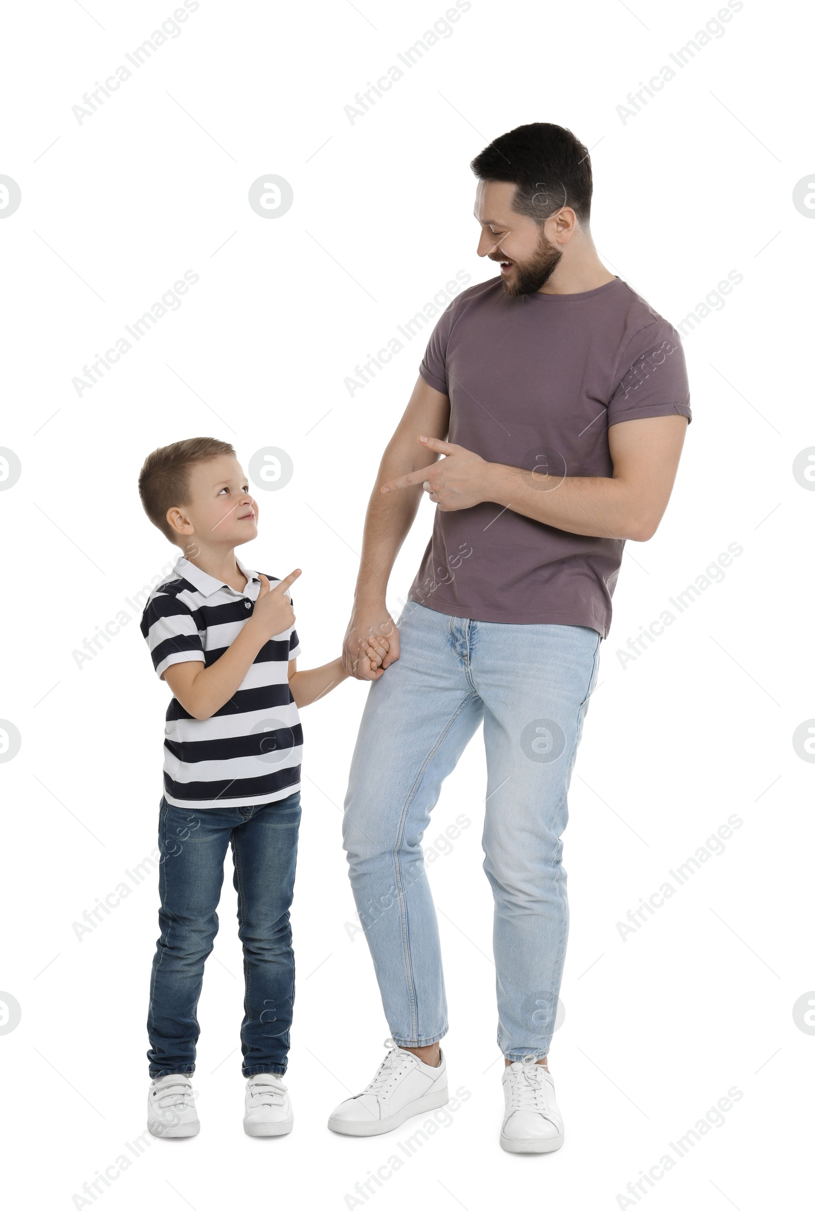 Photo of Happy father and his cute little son on white background