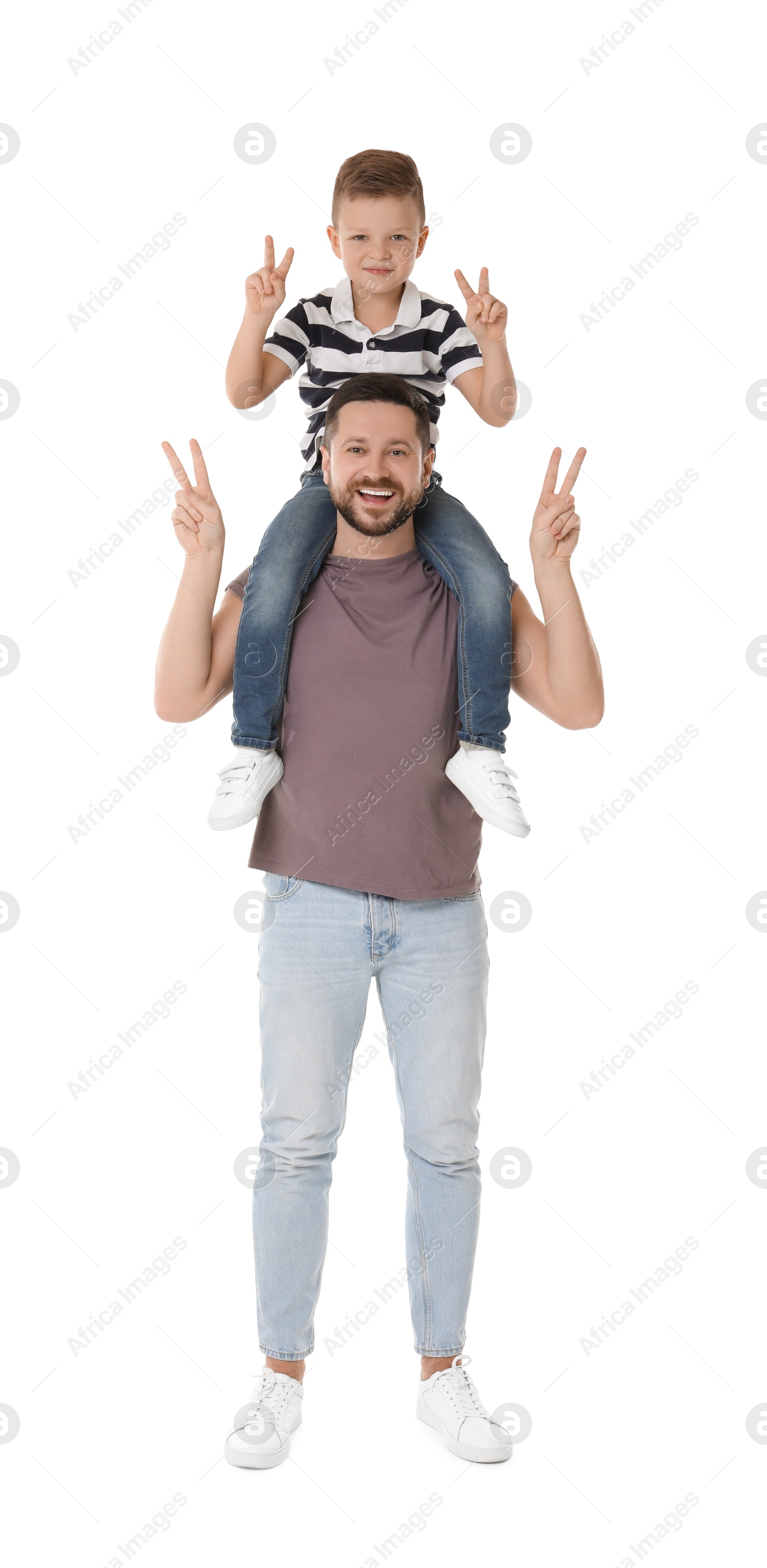 Photo of Happy father and his cute little son showing V-sign on white background