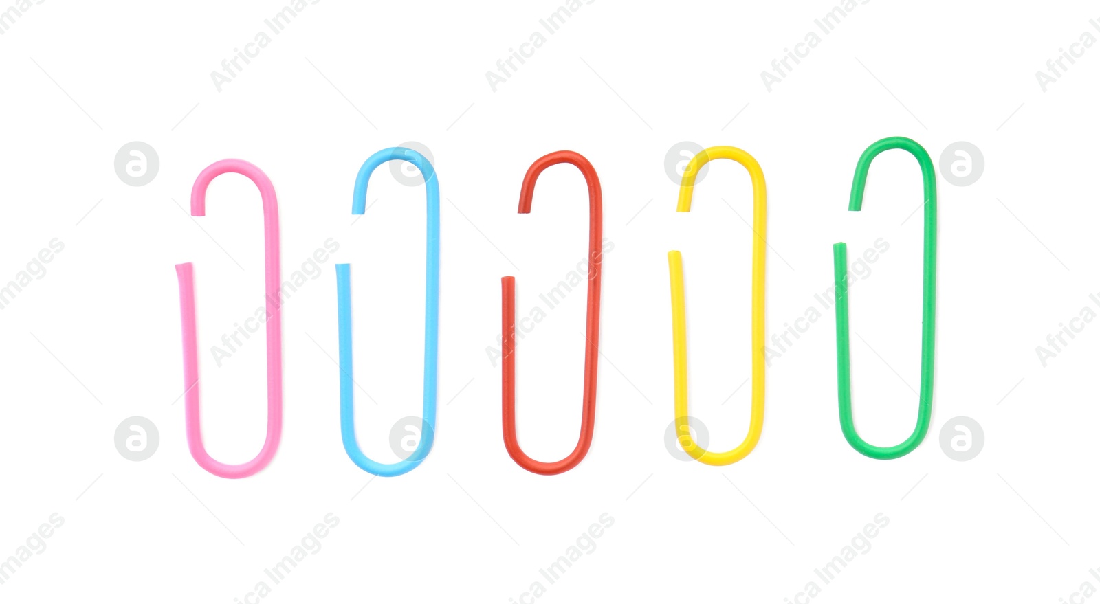 Photo of Colorful paper clips isolated on white, top view