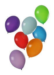 Many colorful balloons in air on white background. Birthday or other party decoration