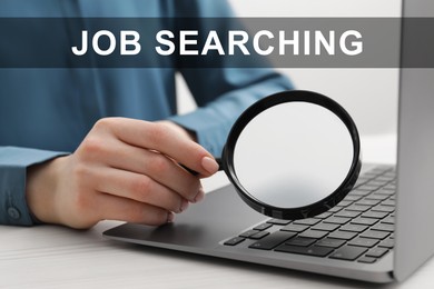 Image of Job search concept. Woman holding magnifying glass near laptop, closeup