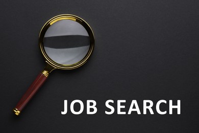 Image of Job Search words and magnifying glass on black background, top view