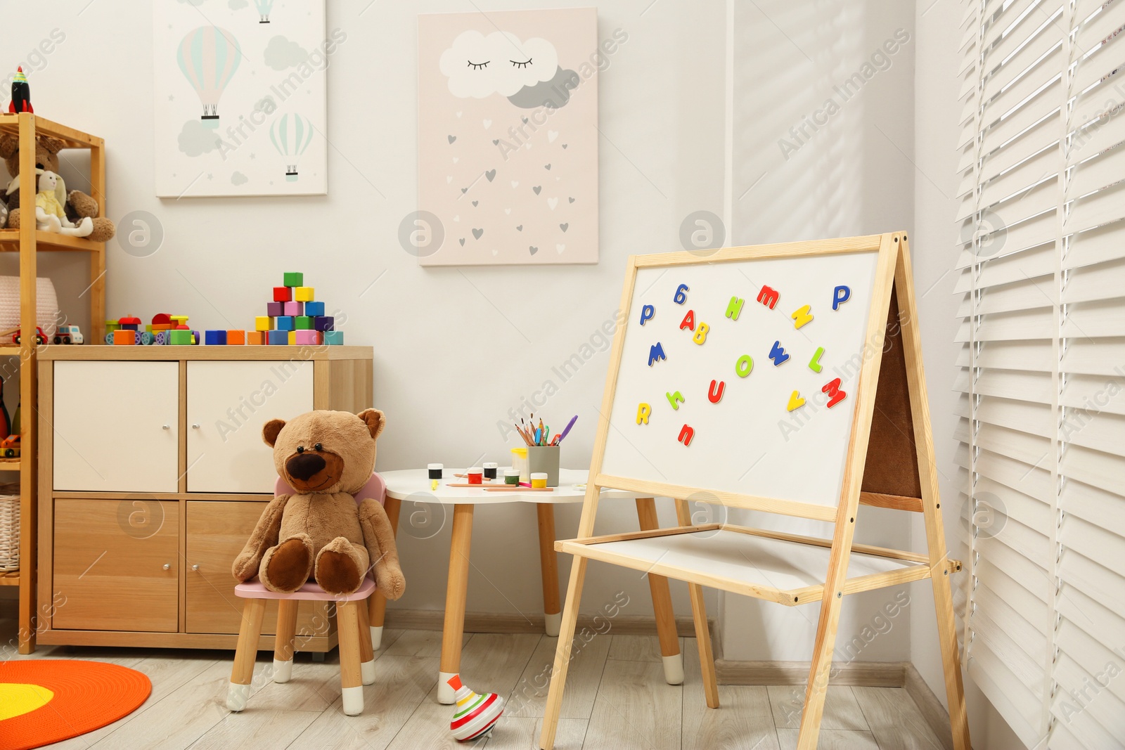 Photo of Child's room interior with many different toys