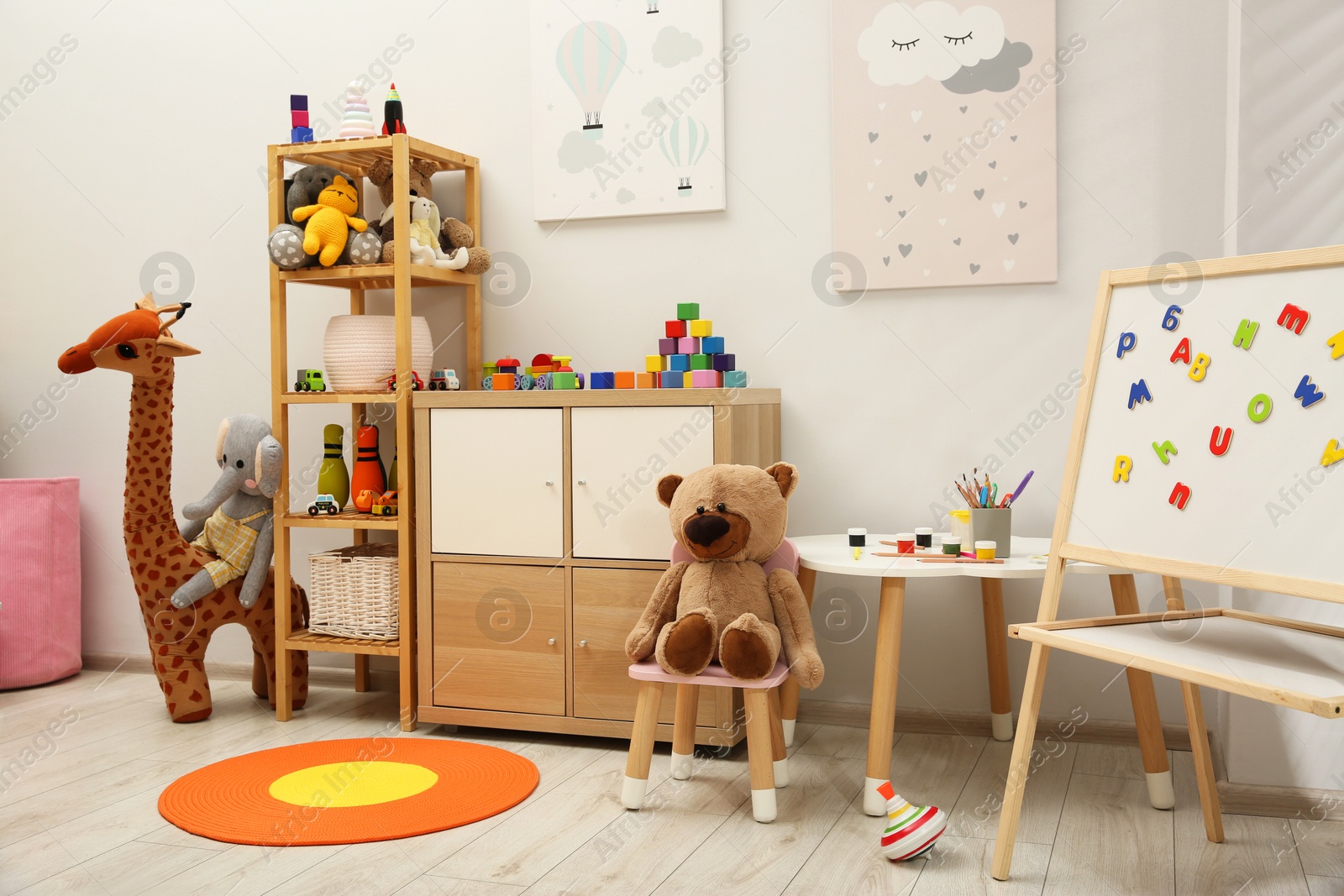 Photo of Child's room interior with many different toys