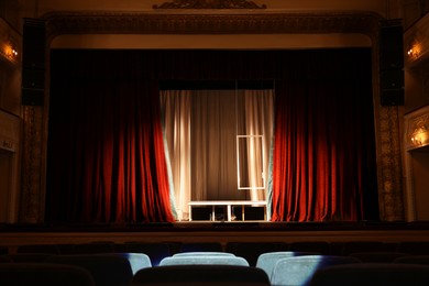 Photo of Theatre interior with stage and rows of comfortable seats