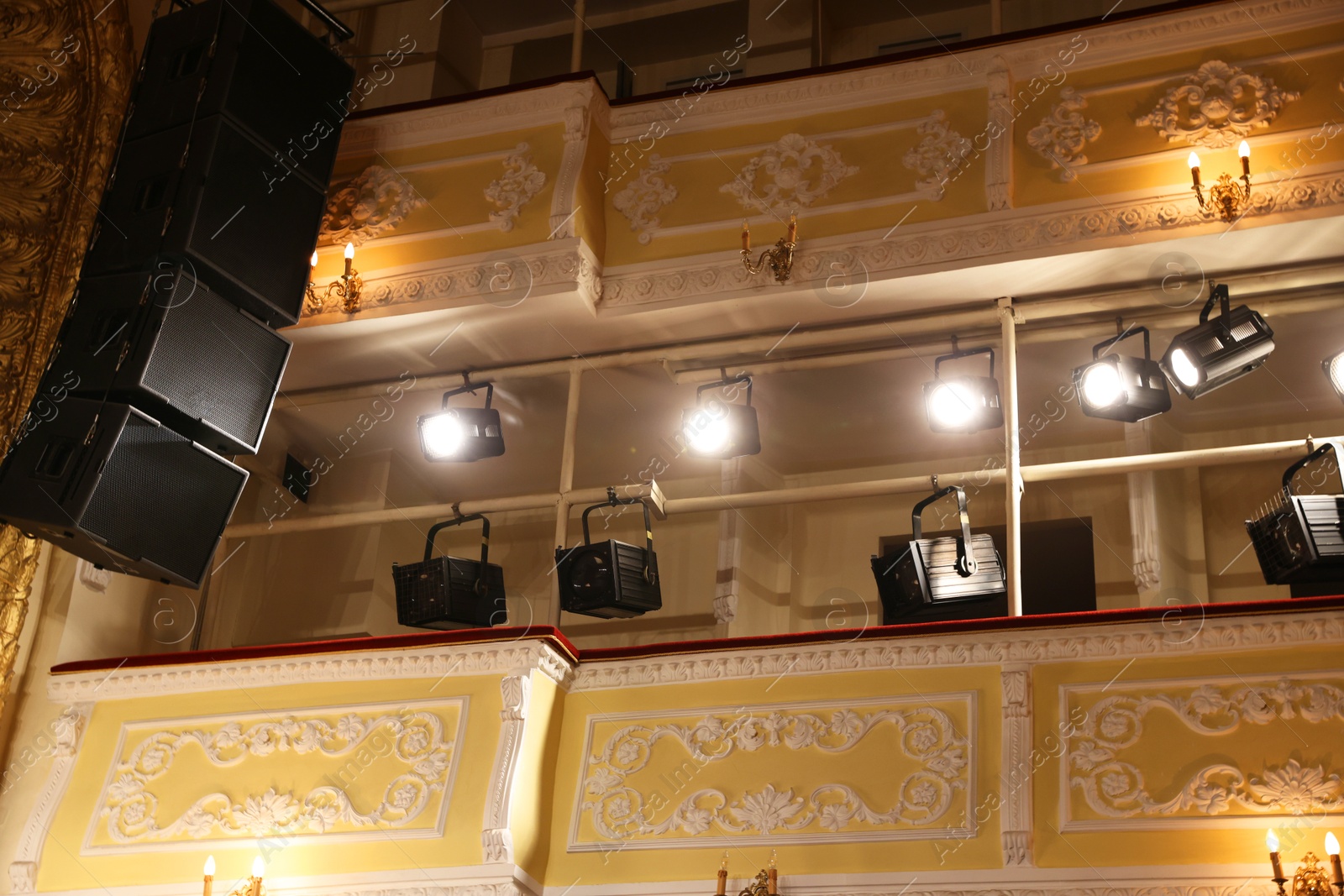 Photo of Professional spotlights in theatre, low angle view