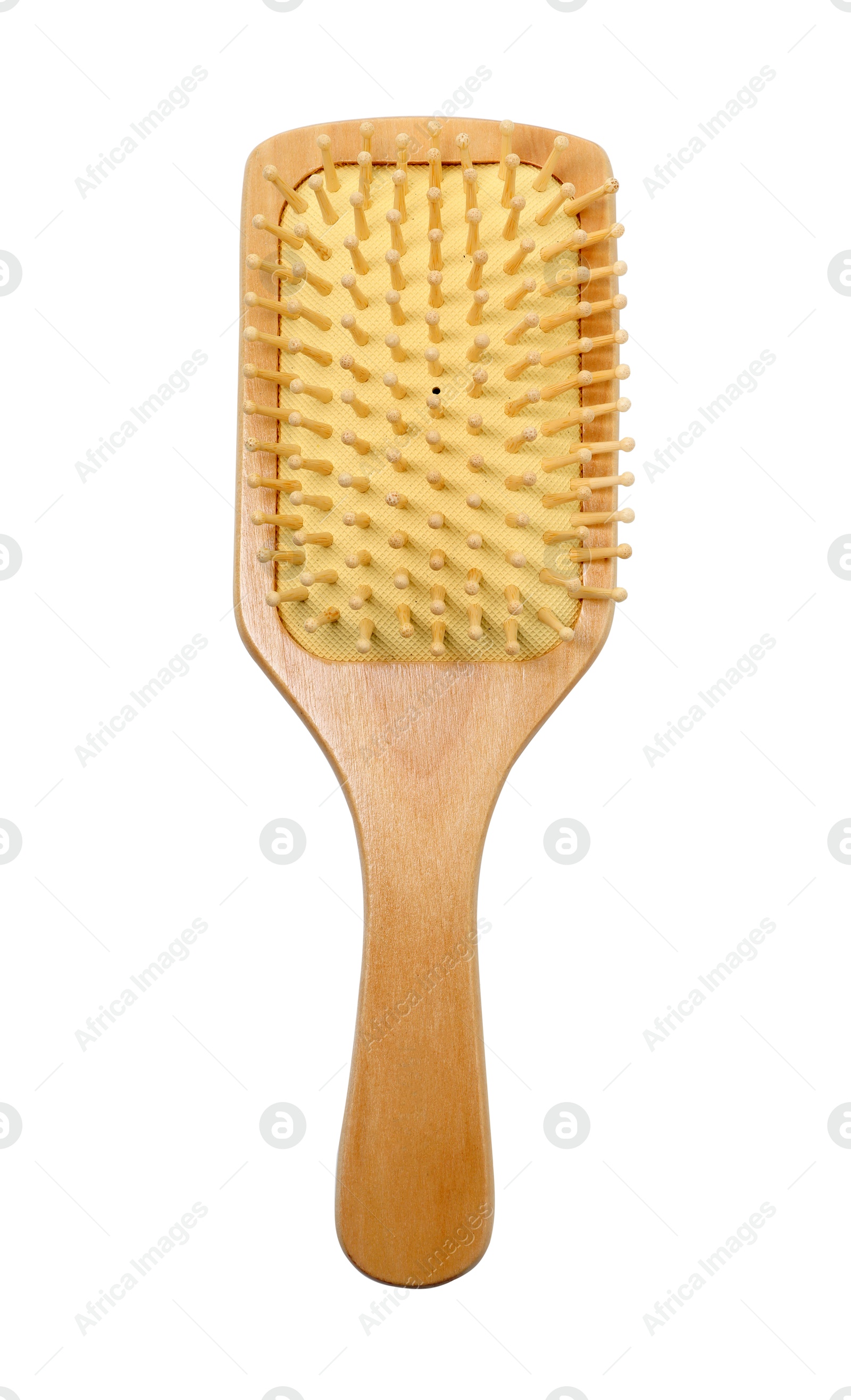 Photo of New wooden hair brush isolated on white, top view