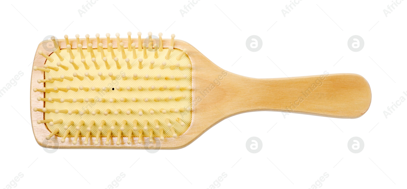 Photo of New wooden hair brush isolated on white, top view