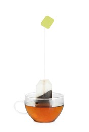 Photo of Cup with tea bag isolated on white