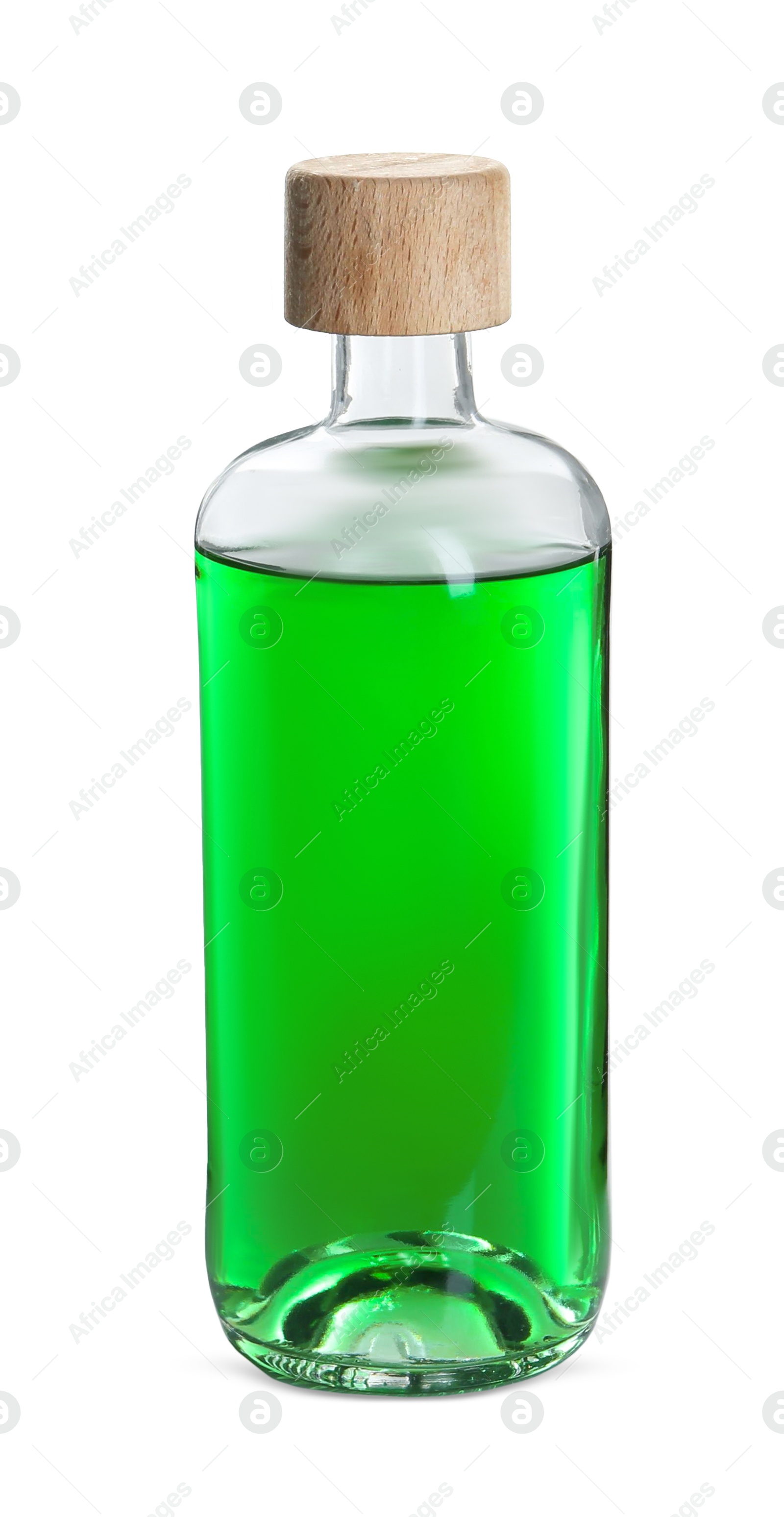 Photo of Absinthe in glass bottle isolated on white