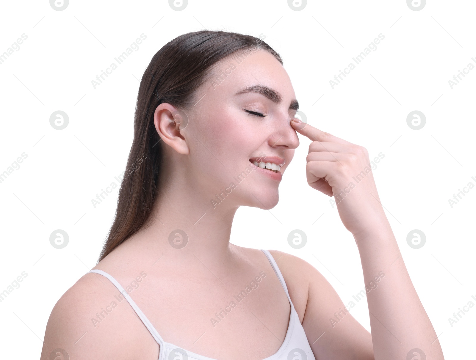 Photo of Woman touching her nose on white background