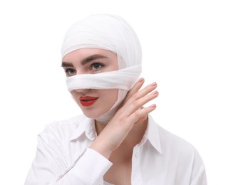 Photo of Woman with nose wrapped in medical bandage after plastic surgery operation on white background