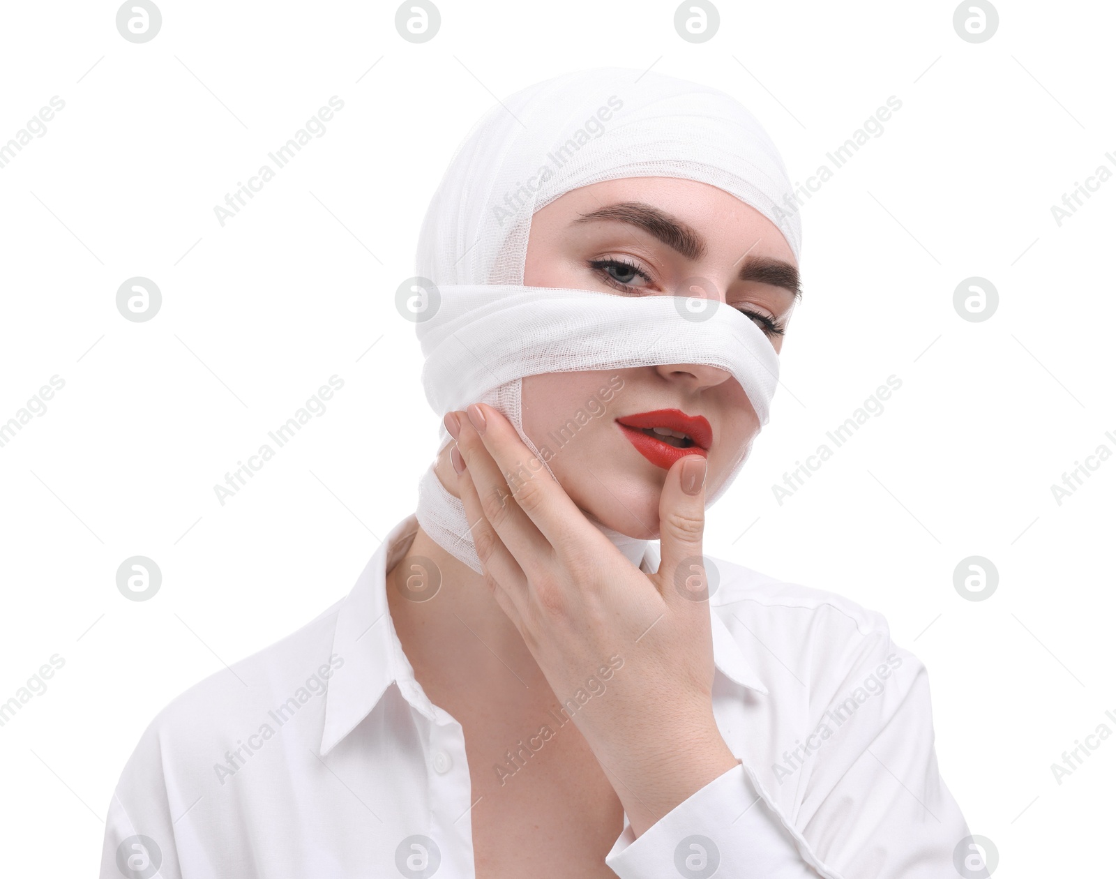 Photo of Woman with nose wrapped in medical bandage after plastic surgery operation on white background