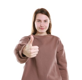 Photo of Woman showing thumbs up on white background. Like gesture