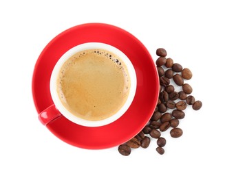 Photo of Red cup of aromatic coffee, saucer and beans isolated on white, top view