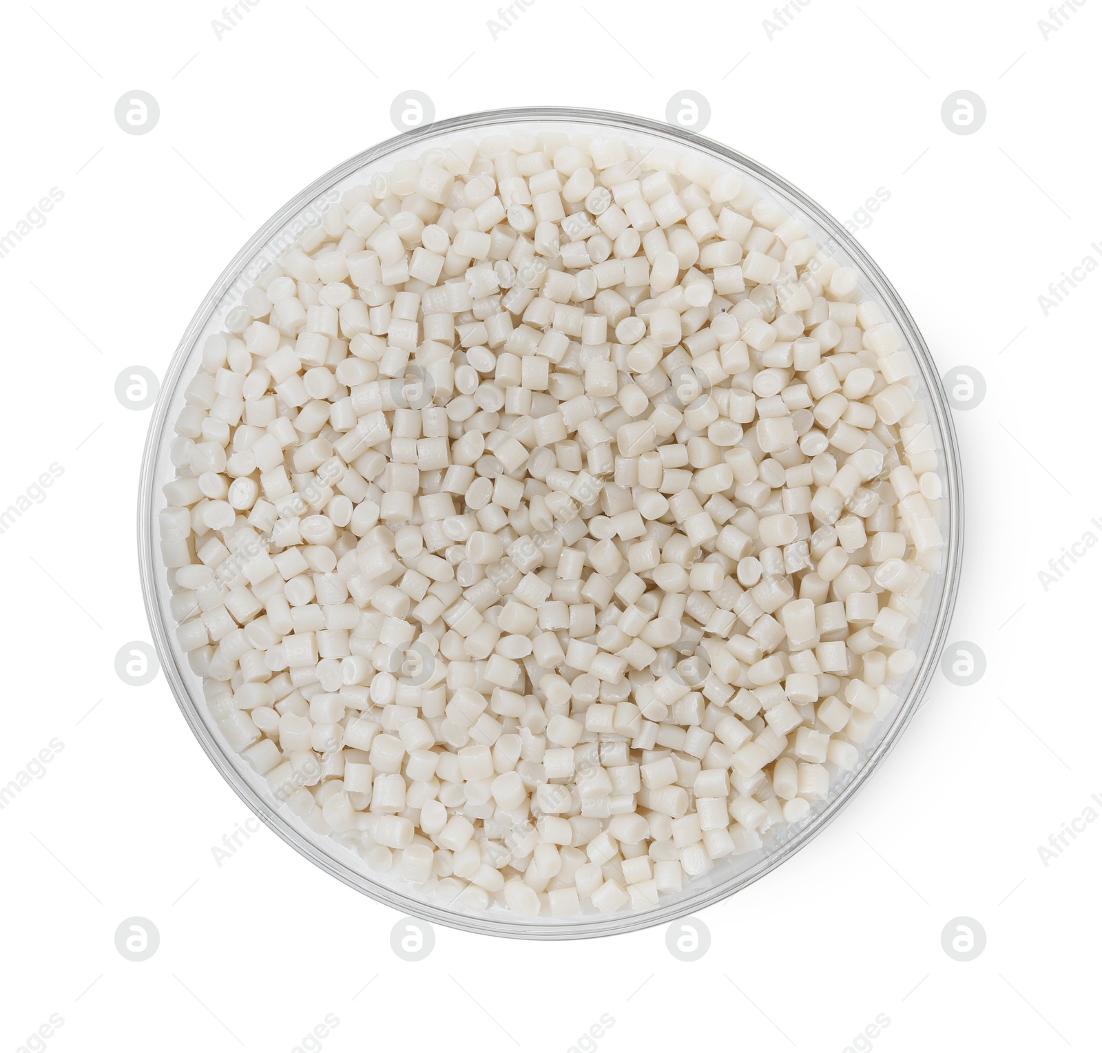 Photo of Plastic granules in petri dish isolated on white, top view