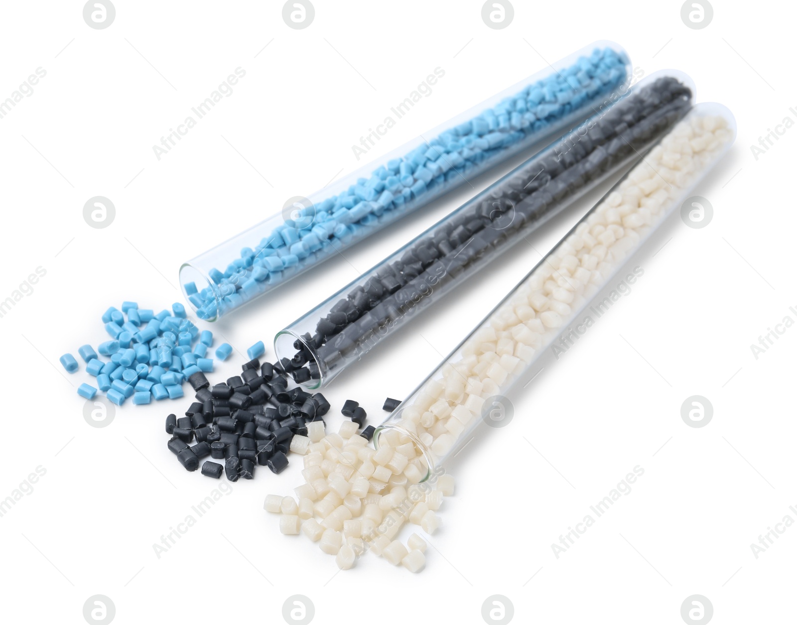 Photo of Colorful plastic granules in test tubes isolated on white