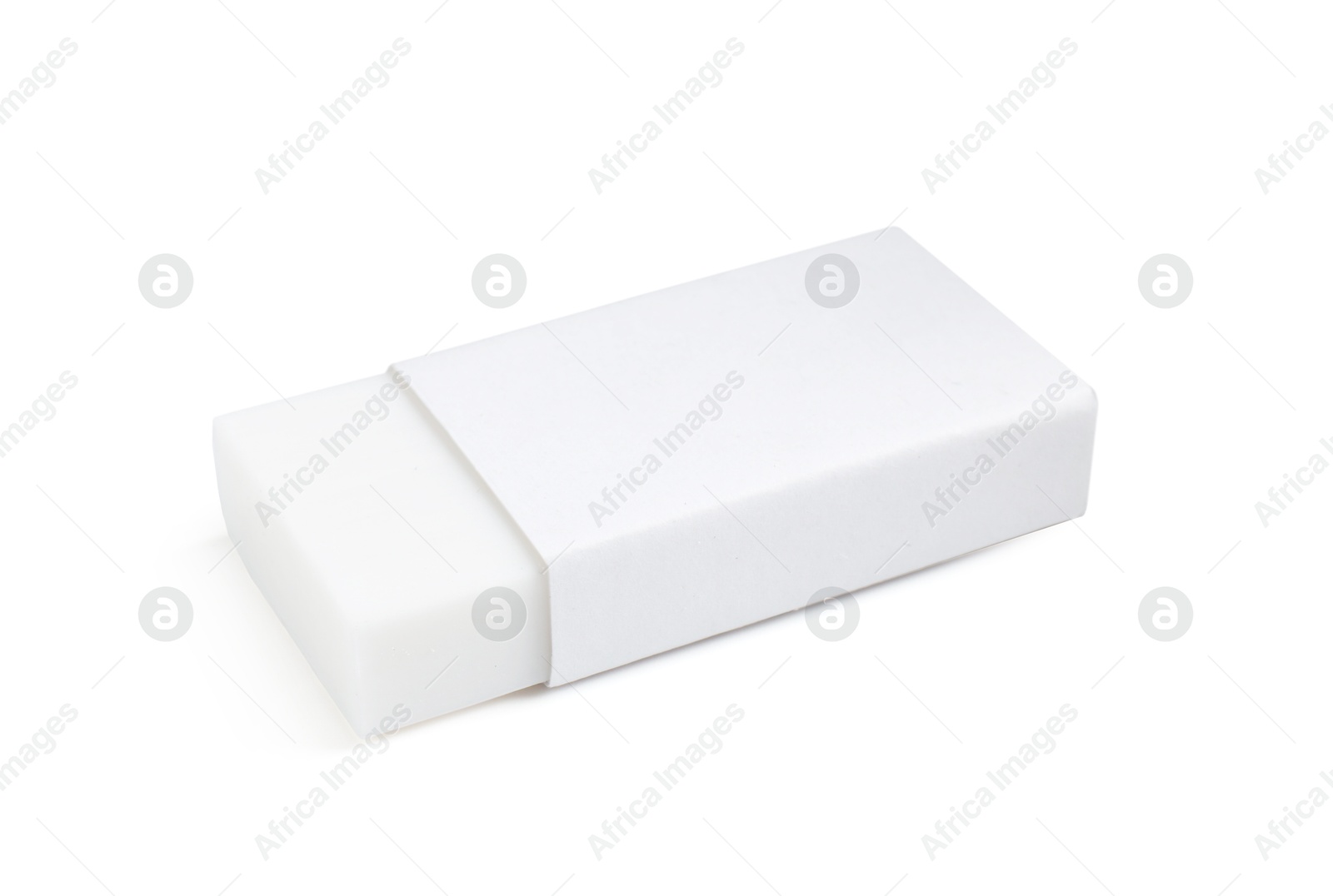 Photo of New eraser isolated on white. School stationery