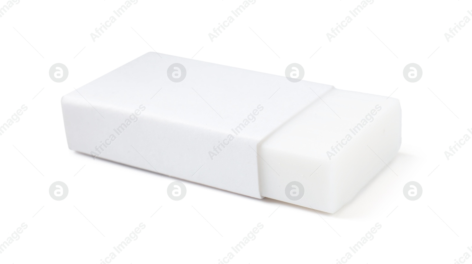 Photo of New eraser isolated on white. School stationery