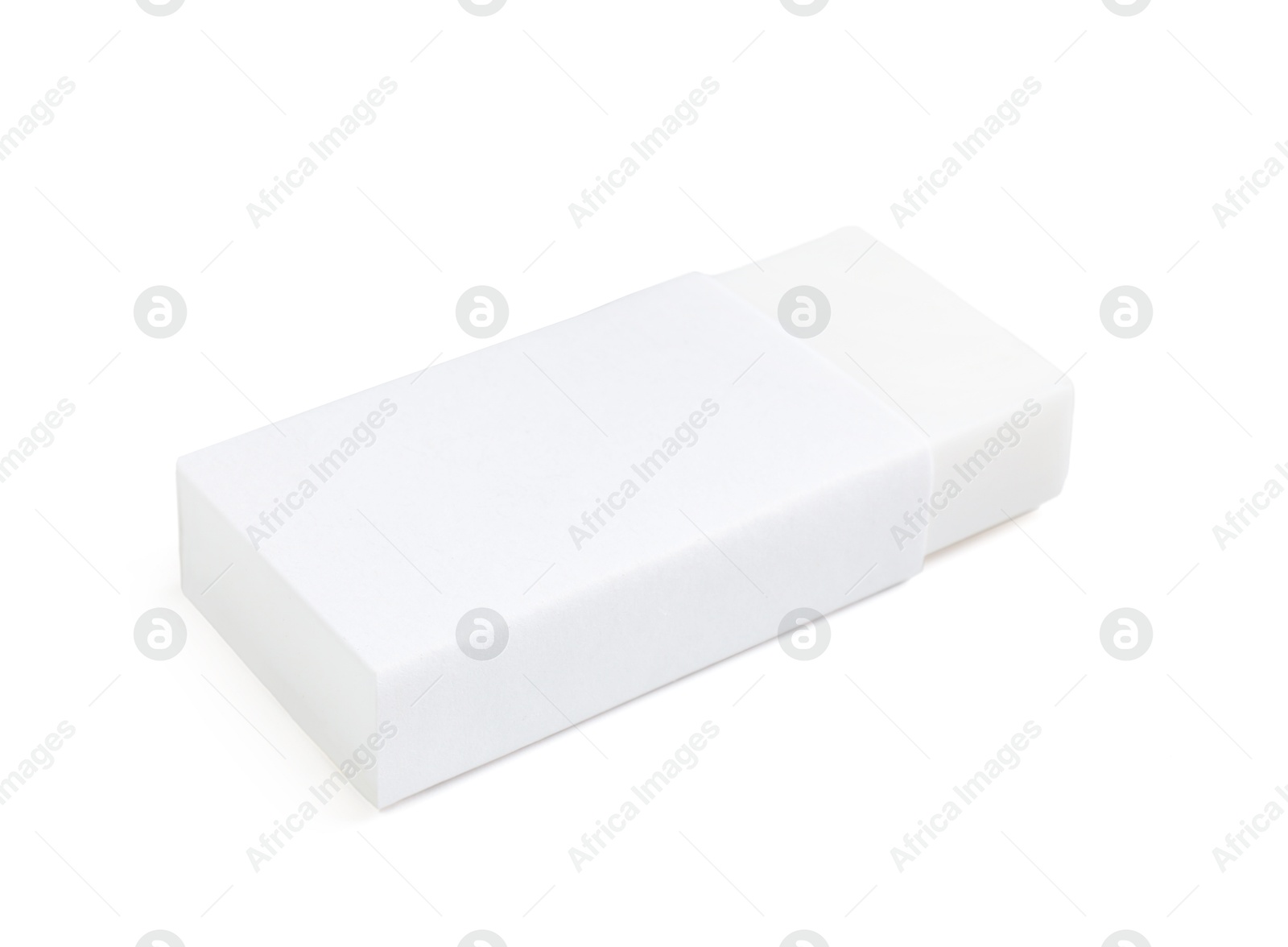 Photo of New eraser isolated on white. School stationery